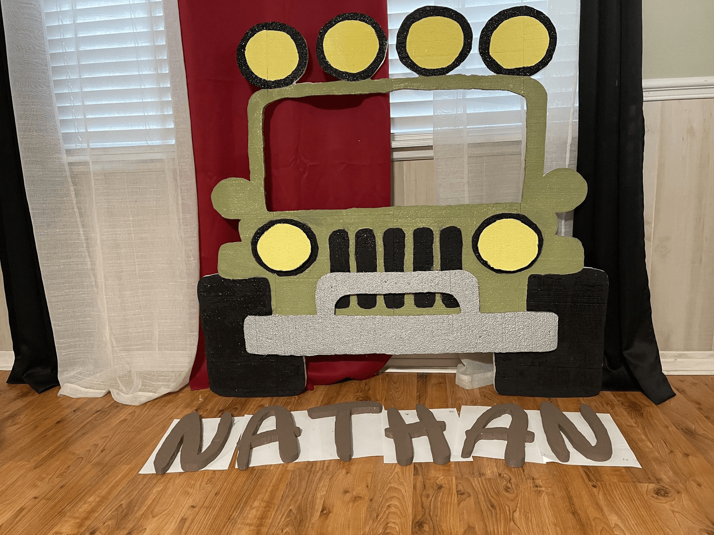 Custom hand-crafted Jeep prop with Nathan name display for a birthday